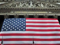 Индексът Dow Jones успя за пръв път в историята да затвори над ключовата бариера от 20 000 пункта