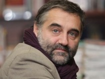 Да гребеш през морето на живите