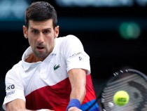 Джокович на четвъртфинал без игра